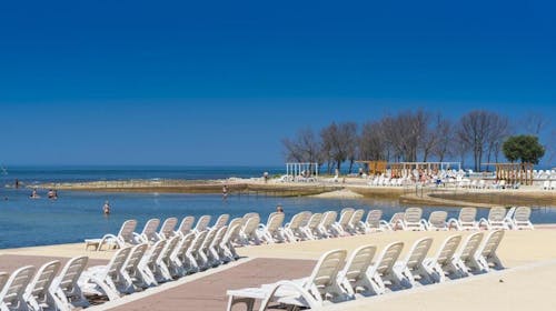 Apartmani Polynesia Plava Laguna - Ljeto u Istri, Umag, Istra, Hrvatska - 360 EUR - 3x noćenje u Studio Economy apartmanu 2+1 strana park za 3 osobe, Korištenje vanjskog bazena za odrasle i bazena za djecu